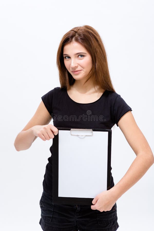 Jovem mulher segura bonita que guarda a prancheta imagem de stock Jovem mulher segura bonita que guarda a prancheta imagem de stock
