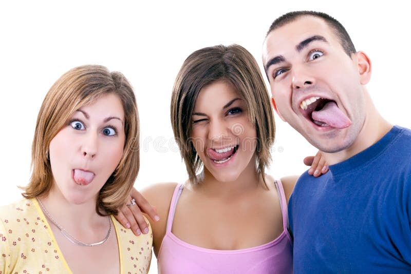 Jovens que fazem as faces parvas foto de stock royalty free Jovens que fazem as faces parvas foto de stock royalty free