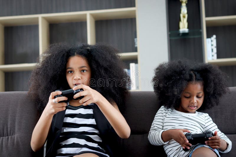 Eleven Year Old Africanamerican School Girl Playing Video Games Online  Stock Photo - Download Image Now - iStock