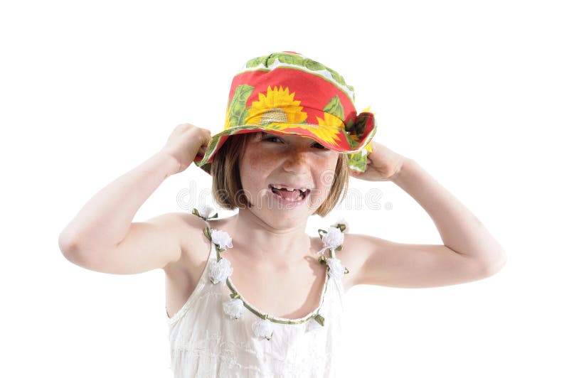 Joyful child posing with hat