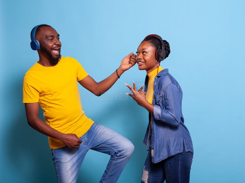 Joyful couple winning video games with joystick on console in studio.  Boyfriend and girlfriend playing online game with controller to win,  feeling happy and relaxed with leisure activity Stock Photo - Alamy