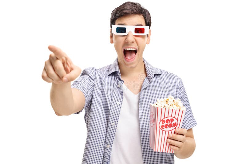 Joyful guy with a pair of 3D glasses and popcorn laughing stock photos