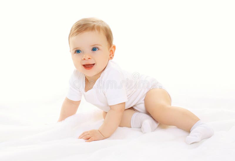 Joyful happy cute baby playing and crawls stock photos