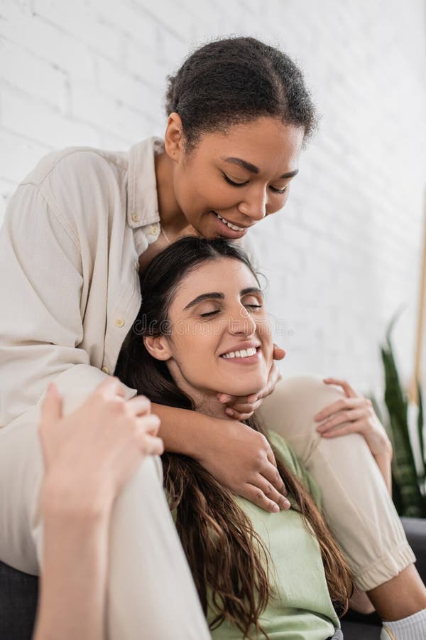 Joyful Lesbian And Multiracial Woman Hugging Stock Image Image Of Indoors Homosexual 277010313