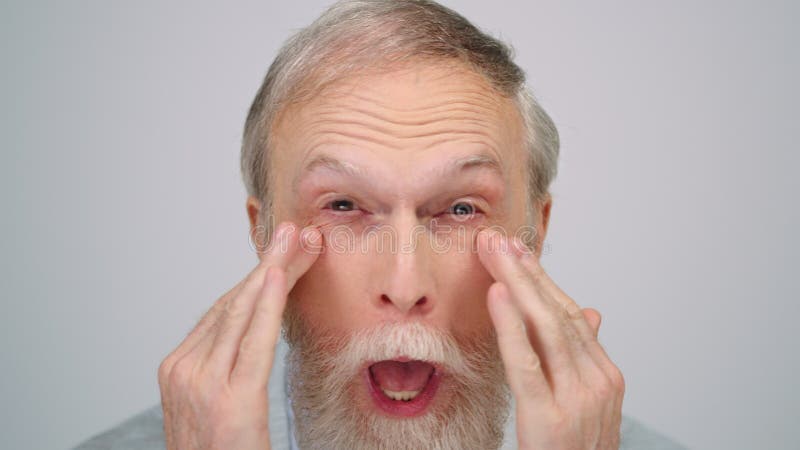 Joyful Man Grimacing in Photo Studio. Old Guy Making Funny Face Indoors. Stock Photo - Image of grey, caucasian: 215880500 Joyful Man Grimacing in Photo Studio. Old Guy Making Funny Face Indoors. Stock Photo - Image of grey, caucasian: 215880500