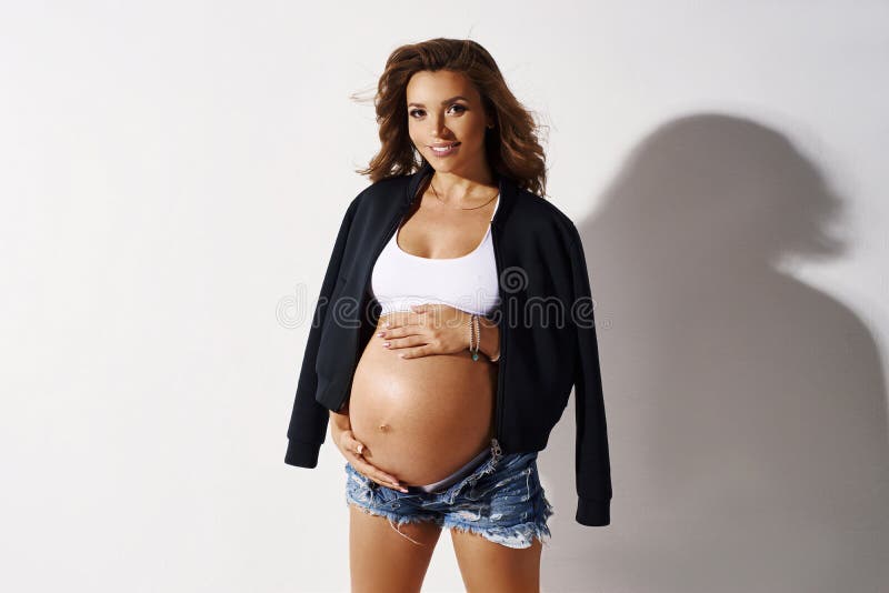 831 Pregnant Woman Shorts Stock Photos - Free & Royalty-Free Stock Photos  from Dreamstime