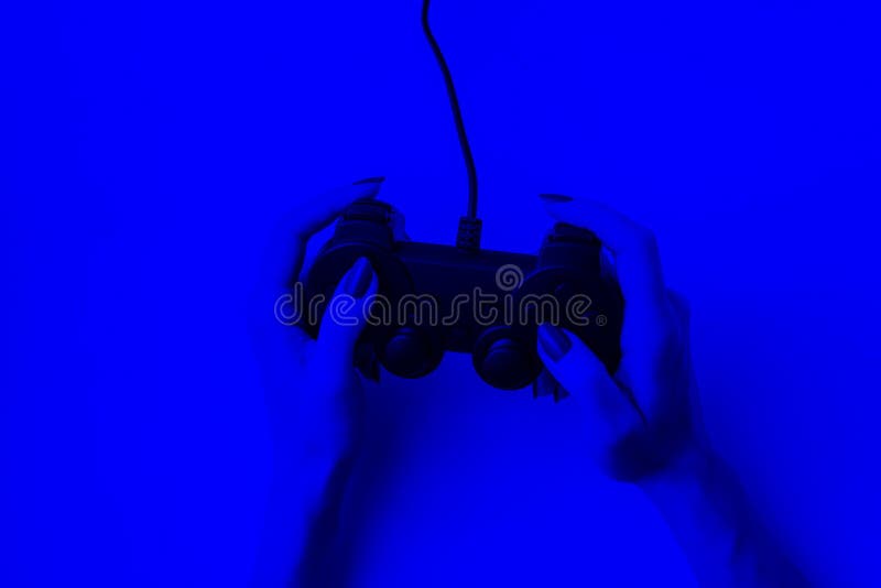 Gamepad in hands, game concept