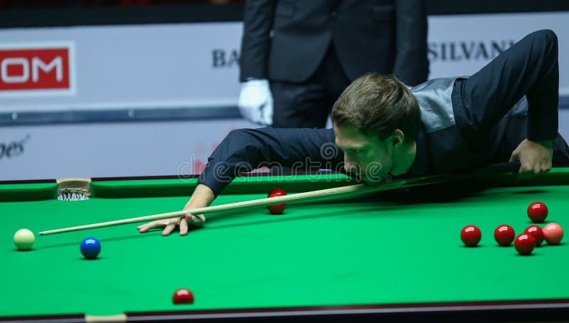JUDD TRUMP. Faces Ronnie O'Sullivan ( not pictured ) in the final of European Masters Snooker, in Bucharest, Romania, Sunday, October 09, 2016 royalty free stock photography JUDD TRUMP. Faces Ronnie O'Sullivan ( not pictured ) in the final of European Masters Snooker, in Bucharest, Romania, Sunday, October 09, 2016 royalty free stock photography