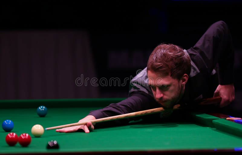 Judd Trump plays friendly tournament in Bucharest. English professional snooker player, Judd Trump, currently World No. 3 plays against Mark Selby and Neil stock images Judd Trump plays friendly tournament in Bucharest. English professional snooker player, Judd Trump, currently World No. 3 plays against Mark Selby and Neil stock images