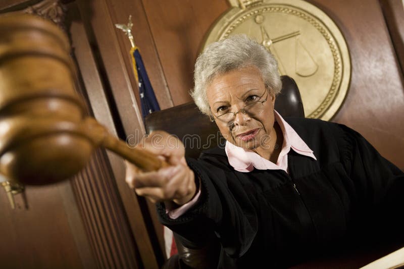 Judge Pointing Gavel In Courtroom Stock Image Image of