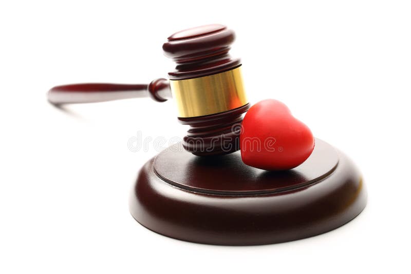 Judge's wooden gavel and heart