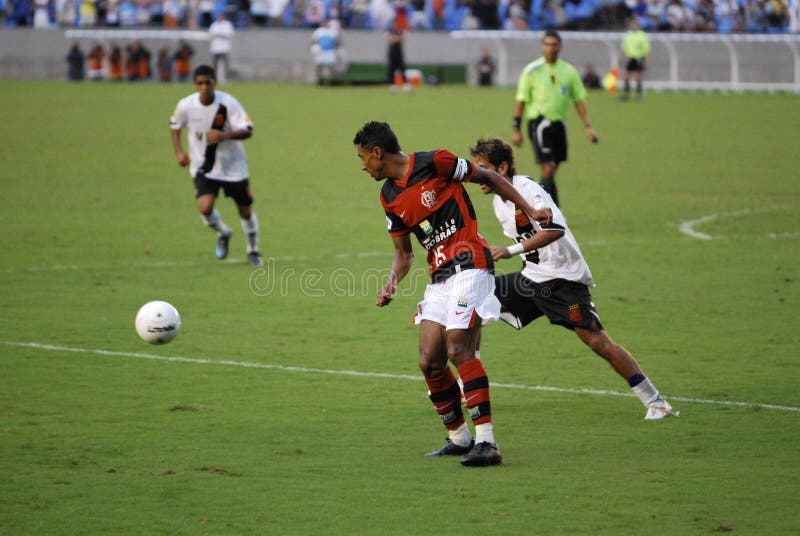 Juego de fútbol foto de archivo Juego de fútbol foto de archivo