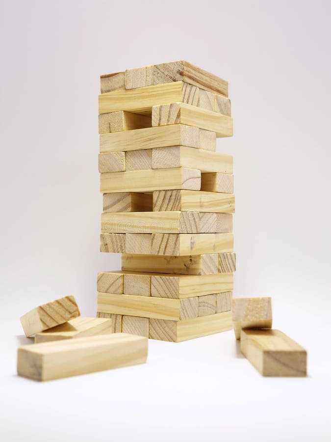 Juego de habilidad, JENGA, torre de tacos de madera.