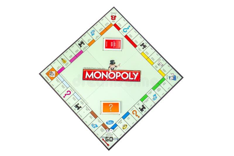 Juego MonopolÃstico de mesa aislado en blanco imágenes de archivo libres de regalías