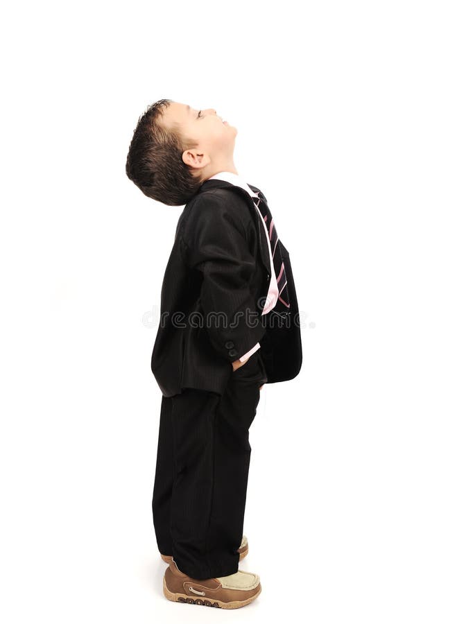 Kid wearing suit isolated looking up. Kid wearing suit isolated looking up