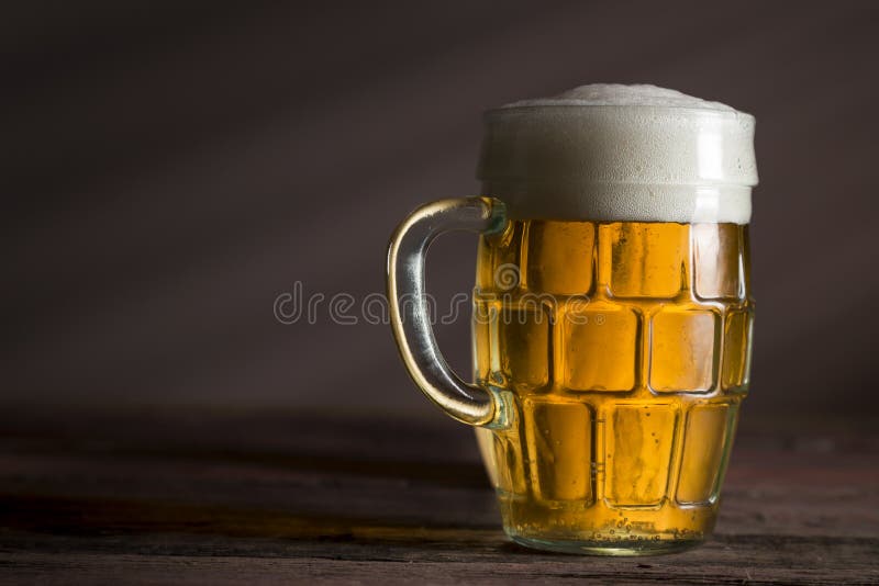 Light beer in a jug stock image. Image of close, brew 108447449
