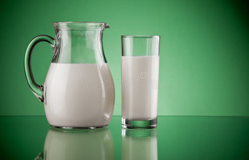 Jug and glass with milk stock image. Image of fluid, full 18353203