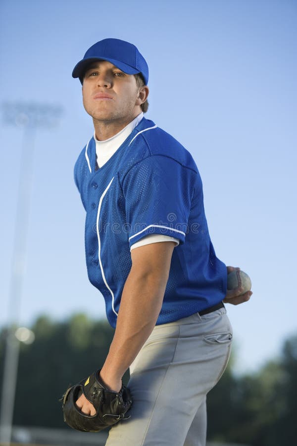 Baseball player about to pitch the ball. Baseball player about to pitch the ball