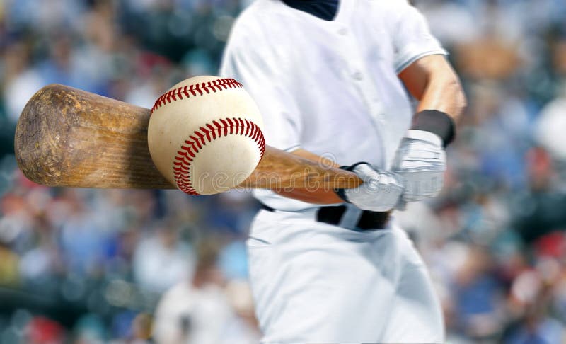 Baseball player hitting ball with bat in close up with blur motion. Baseball player hitting ball with bat in close up with blur motion