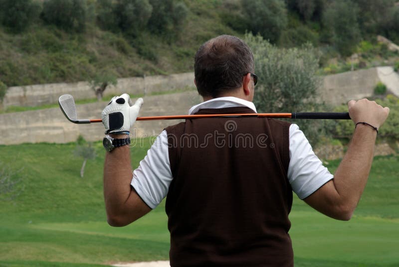 Golf player - man with golf stick. Golf player - man with golf stick