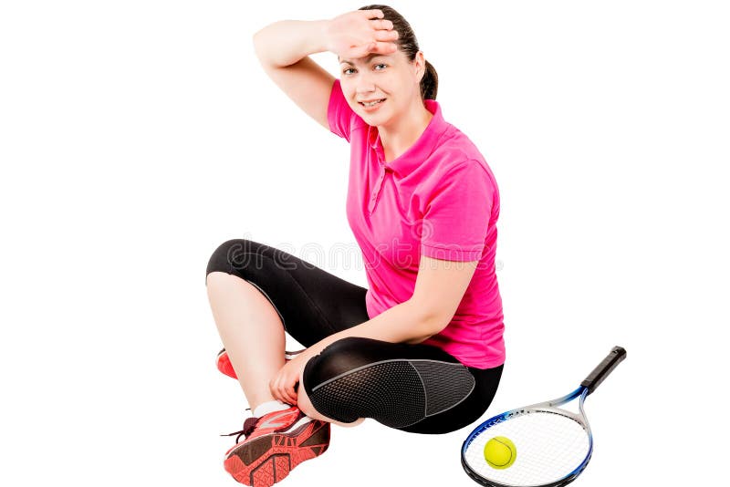Jugador de tenis que descansa después de un entrenamiento, y de trapos el sudor imagen de archivo libre de regalías Jugador de tenis que descansa después de un entrenamiento, y de trapos el sudor imagen de archivo libre de regalías