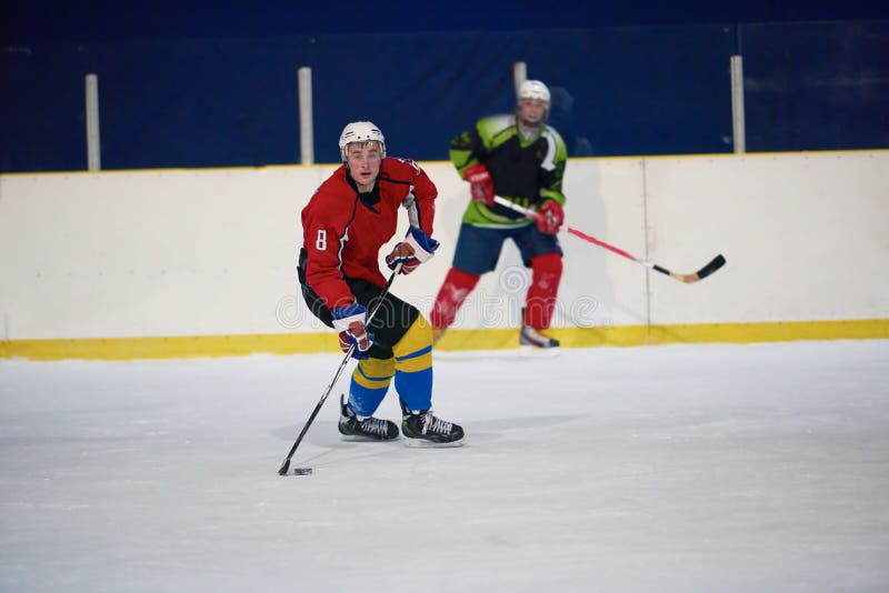 Jugadores del deporte del hockey sobre hielo foto de archivo libre de regalías Jugadores del deporte del hockey sobre hielo foto de archivo libre de regalías