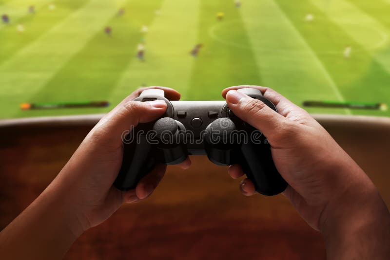 Jugar a los juegos video fotografía de archivo libre de regalías Jugar a los juegos video fotografía de archivo libre de regalías