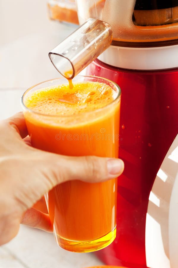 Jugo de zanahoria. foto de archivo. Imagen de extractor 33463236