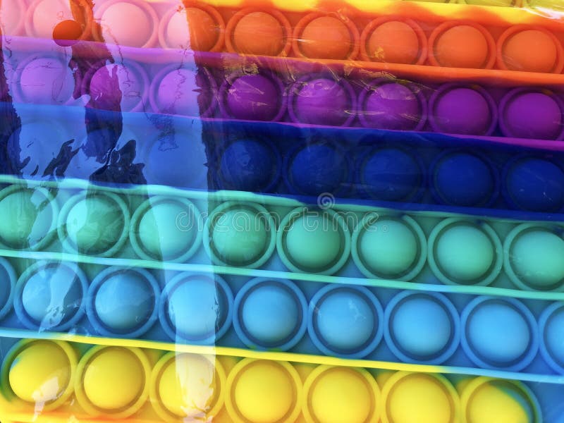 Juguete de moda antiestrés popit de silicona arco iris infantil fotografía de archivo libre de regalías