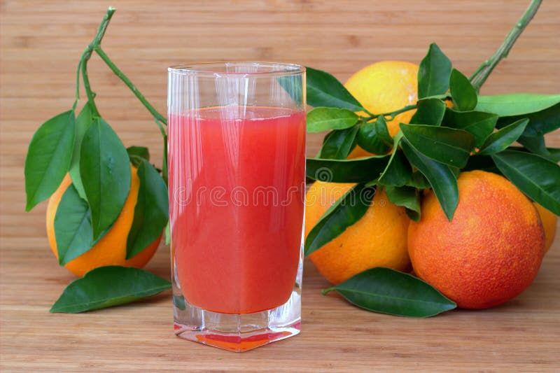 Juicing Blood Oranges To Make Orange Juice Stock Image - Image of food
