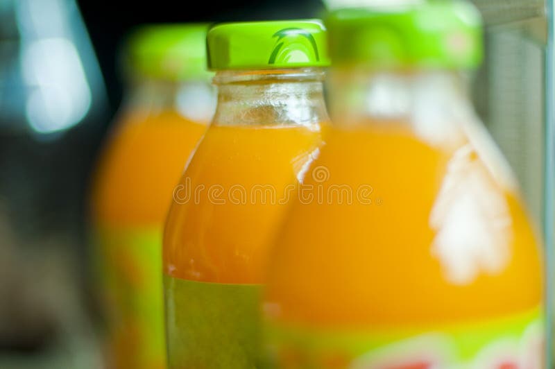 Bottles of juice stock photo. Image of drops, breakfast 27393160