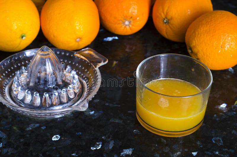 The Juice Press with Oranges Stock Photo Image of background, citrus