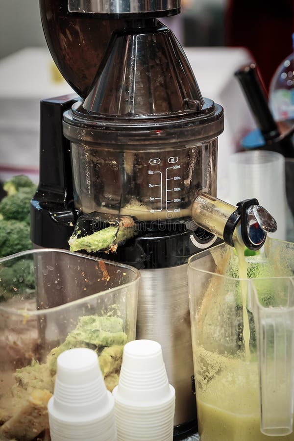 Juicer and vegetable juice stock photo. Image of glass 127001840