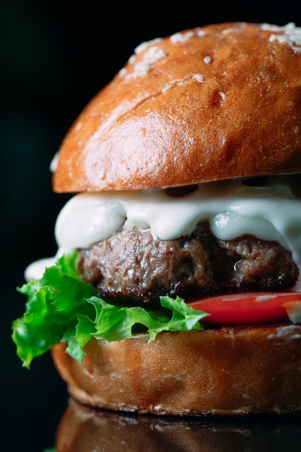 Juicy Beef Burger on a Black Background. Stock Image Image of burger