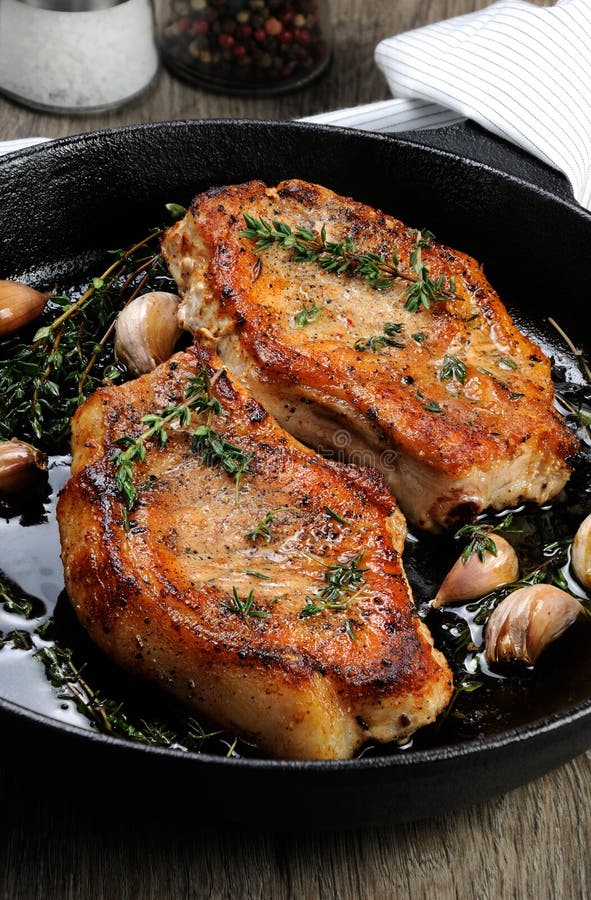 Roasted Pork Steak in Frying Pan Stock Photo - Image of frying, juicy ...