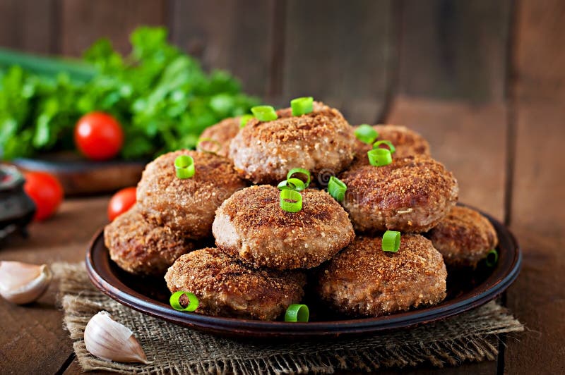 Juicy Delicious Meat Cutlets on a Dark Table. Russian CuisineJuicy ...