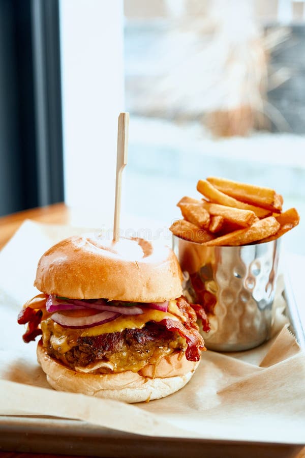 Juicy Home Made Burger Served with Crispy Fries. Stock Image Image of