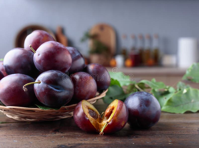 Juicy Plums on a Kitchen Table Stock Photo Image of color, plums 146476728