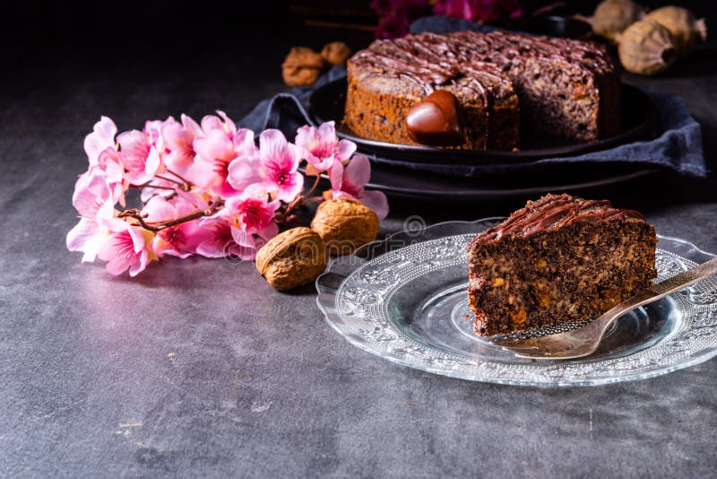 A Juicy Poppy Seed Cake with Apples and Chocolate Glaze Stock Photo