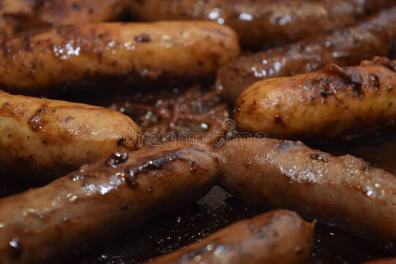 Juicy sausages cooking stock image. Image of juicy, sausages 82368697