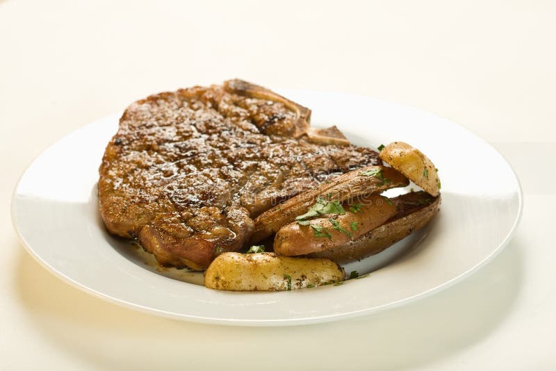 Juicy Steak and Potatoes stock photo. Image of marks, tasty - 6993032