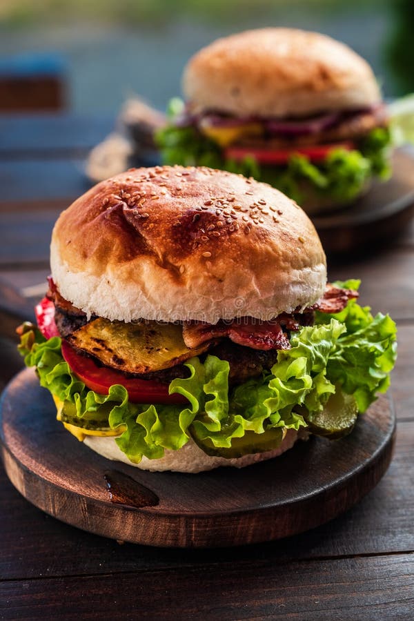 Juicy Tasty Cheeseburger with Beef, Lettuce, Pickles, Tomato and Stock ...