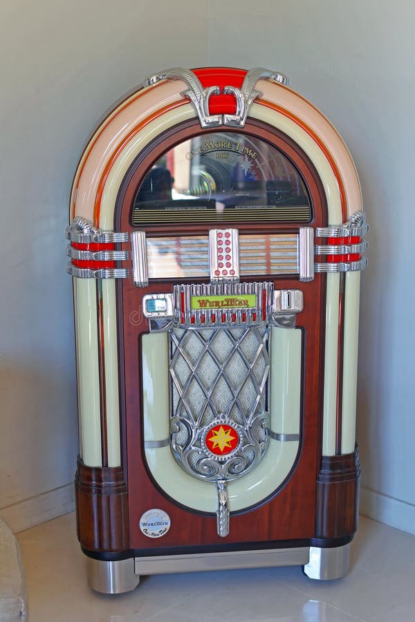 Cannes, France - July 11, 2013: Jukebox Replica Automated Cd Music Player at Corner in Cannes, France. Cannes, France - July 11, 2013: Jukebox Replica Automated Cd Music Player at Corner in Cannes, France