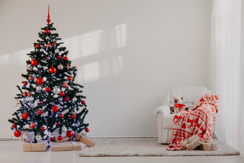 Christmas tree in a white room for Christmas with gifts 2. Christmas tree in a white room for Christmas with gifts 2