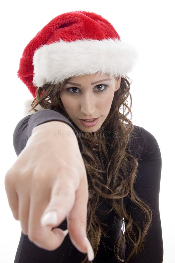 julhatt som pekar den slitage kvinnan dig arkivfoto julhatt som pekar den slitage kvinnan dig arkivfoto