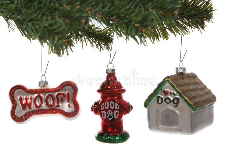 Dog Themed Christmas ornaments on a tree over white. Dog Themed Christmas ornaments on a tree over white