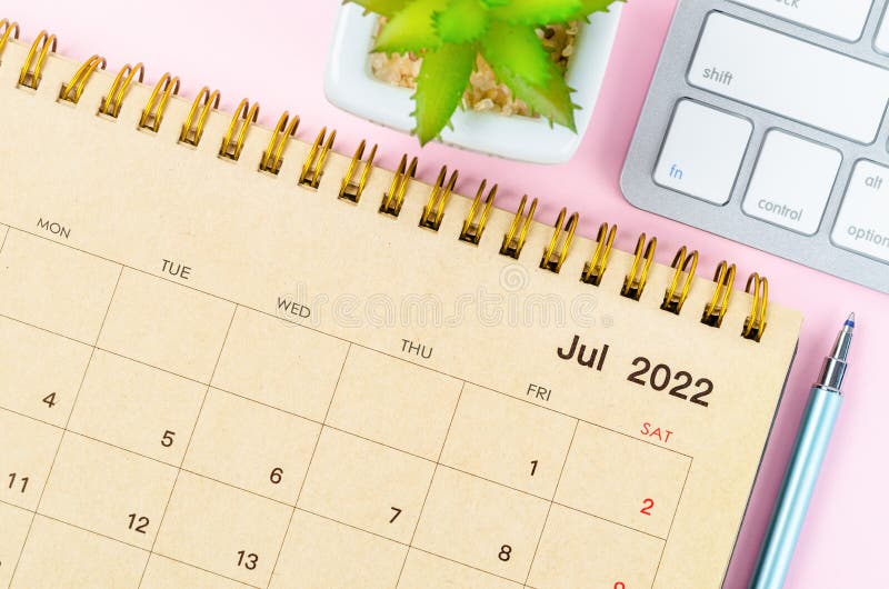 July 2022 Desk Calendar With Keyboard Computer On Pink Background Stock 
