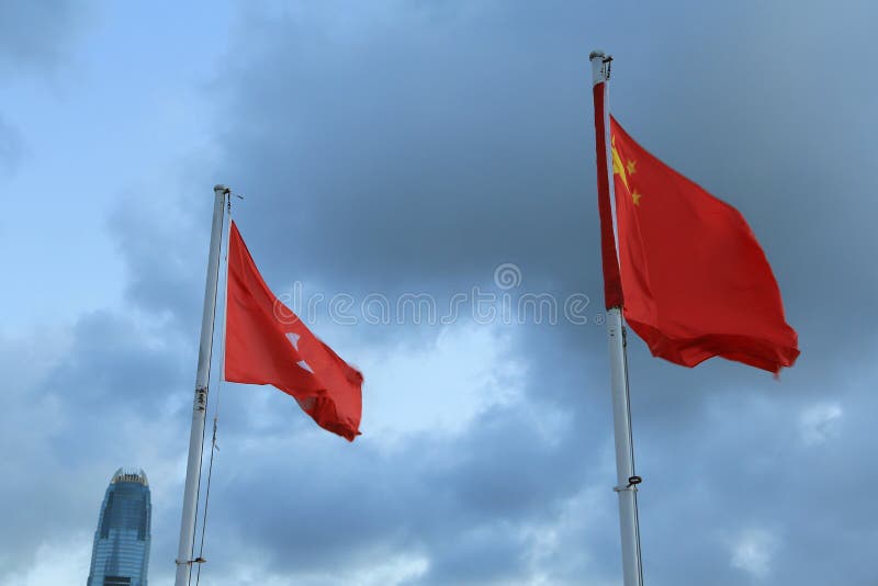 HK and China Flag with Business Office Tower 1 July 2012 Editorial