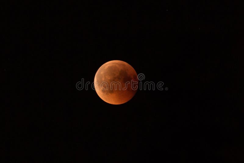 July 27, 2018 is the longest lunar eclipse of the century. The moon is painted red-brown because of the shadow of the royalty free stock photos July 27, 2018 is the longest lunar eclipse of the century. The moon is painted red-brown because of the shadow of the royalty free stock photos