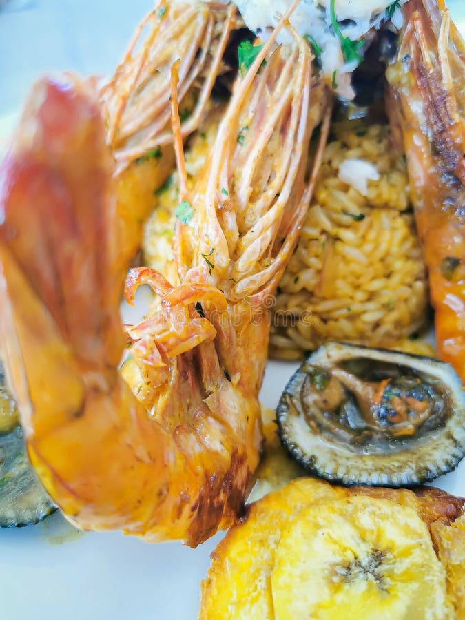 Jumbo Prawns and Grilled Shrimp with Rice and Coconut. Stock Photo